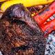 Grillad picanha över öppen eld